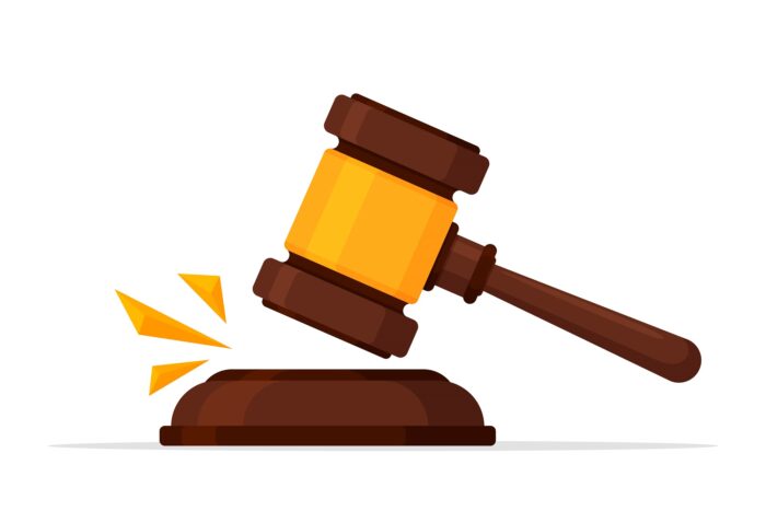 litigation illustration - a gavel pounding